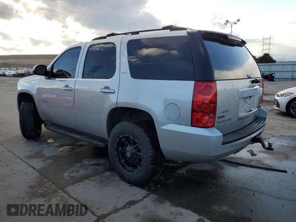 2011 GMC Yukon SLT with VIN 1GKS2CE0XBR213229, listed as a Copart auction lot 47665285 with 185,782 mi miles and Salvage Title. Bid and sale history available at carsss.com. Image 2.