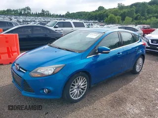 2014 Ford Focus Titanium with VIN 1FADP3N28EL119791, listed as a IAAI auction lot 42712044 with 144,338 mi miles and . Bid and sale history available at DreamBid. Image 2.
