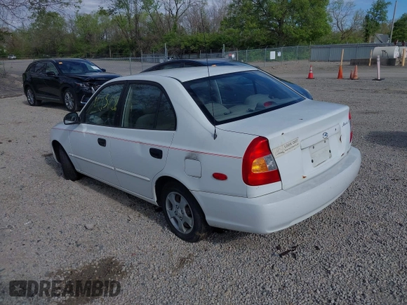 2002 Hyundai Accent GL with VIN KMHCG45C92U347708, listed as a IAAI auction lot 42137086 with 73,271 mi miles. Bid and sale history available at carsss.com. Image 3.
