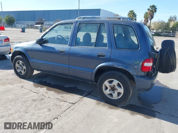 2001 Kia Sportage with VIN KNDJB723015065059, listed as a IAAI auction lot 41554856 with 170,827 mi miles. Bid and sale history available at carsss.com. Image 3.