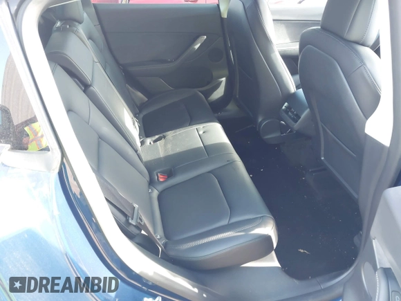2022 Tesla Model Y Long Range z VIN 7SAYGDEE0NF429399, wystawiony jako IAAI lot #42333630 z przebiegiem 32 937 mil mil oraz . Historia ofert i sprzedaży dostępna na DreamBid. Obrazek 8.