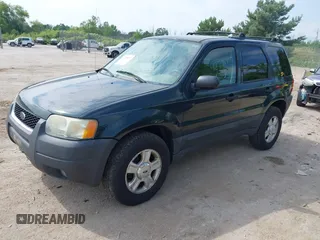 2004 Ford Escape XLT with VIN 1FMYU93124DA08711, listed as a IAAI auction lot 42798957 with 231,771 mi miles and . Bid and sale history available at DreamBid. Image 2.