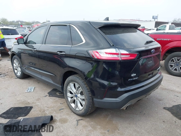 2019 Ford Edge Titanium z VIN 2FMPK3K91KBB95867, wystawiony jako IAAI lot #41798923 z przebiegiem 39 942 mil mil oraz . Historia ofert i sprzedaży dostępna na DreamBid. Obrazek 3.