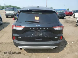2020 Ford Escape SE z VIN 1FMCU9G68LUC42639, wystawiony jako Copart lot #59001055 z przebiegiem 27 681 mil mil oraz Nie do naprawy • Non repairable. Historia ofert i sprzedaży dostępna na DreamBid. Obrazek 6.