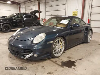 2011 Porsche 911 Turbo with VIN WP0AD2A93BS766801, listed as a IAAI auction lot 41566167 with 66,785 mi miles. Bid and sale history available at carsss.com. Image 2.