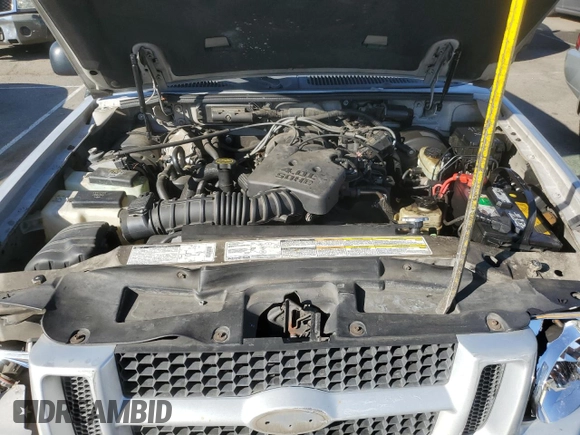 2002 Ford Explorer with VIN 1FMCU60E52UB90353, listed as a Copart auction lot 75659554 with 212,592 mi miles and Salvage title. Bid and sale history available at DreamBid. Image 11.