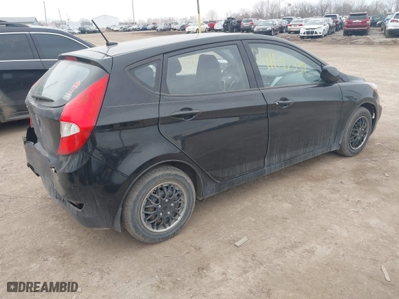 2014 Hyundai Accent GS with VIN KMHCT5AE6EU197814, listed as a IAAI auction lot 41697539 with 228,490 mi miles. Bid and sale history available at carsss.com. Image 4.