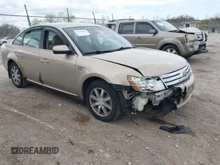 2008 Ford Taurus SEL z VIN 1FAHP24W48G135807, wystawiony jako IAAI lot #42198523 z przebiegiem 177 607 mil mil oraz . Historia ofert i sprzedaży dostępna na DreamBid. Obrazek 1.