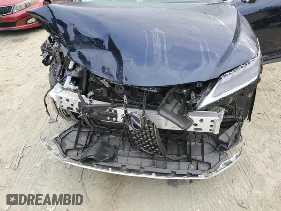2022 Lexus RX with VIN JTJJGKFA7N2029399, listed as a Copart auction lot 70560884 with 13,672 mi miles and Salvage Title. Bid and sale history available at carsss.com. Image 12.