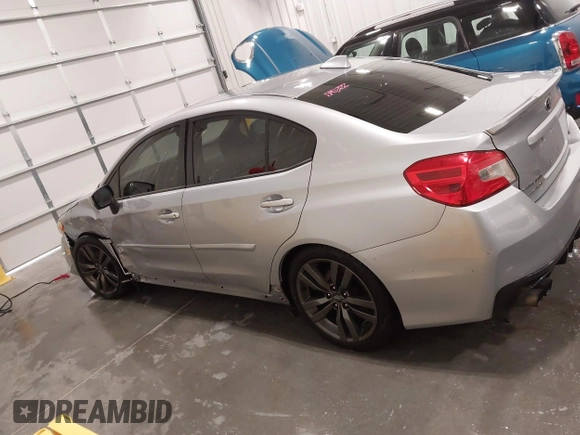 2016 Subaru WRX Premium with VIN JF1VA1E64G8811369, listed as a IAAI auction lot 41243335 with 129,319 mi miles. Bid and sale history available at carsss.com. Image 15.