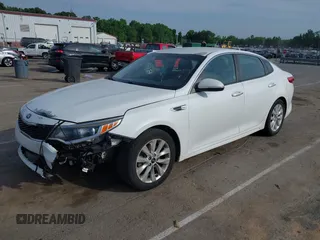 2016 Kia Optima LX with VIN 5XXGT4L34GG061718, listed as a IAAI auction lot 42176256 with 115,572 mi miles and . Bid and sale history available at carsss.com. Image 2.