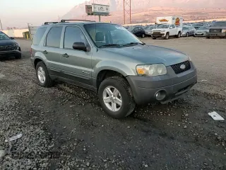 2006 Ford Escape Hybrid with VIN 1FMCU96H36KC55432, listed as a Copart auction lot 83012824 with 145,619 mi miles and Salvage Title. Bid and sale history available at carsss.com. Image 10.