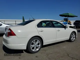 2012 Ford Fusion SE with VIN 3FAHP0HA5CR365828, listed as a Copart auction lot 61581295 with 142,207 mi miles and Salvage title. Bid and sale history available at DreamBid. Image 3.