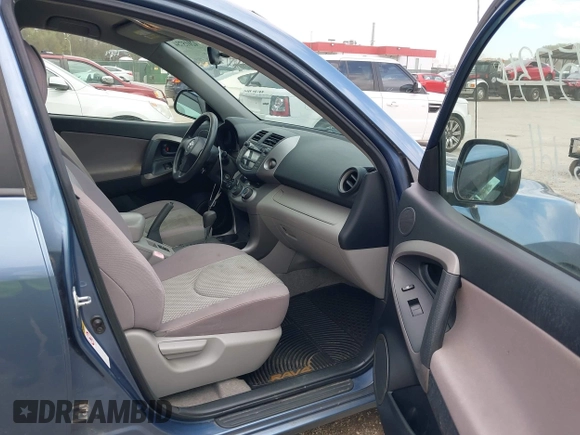 2007 Toyota RAV4 with VIN JTMBD33V575057166, listed as a IAAI auction lot 42015734 with 202,862 mi miles. Bid and sale history available at carsss.com. Image 5.