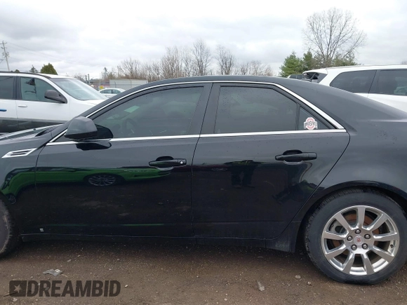 2008 Cadillac CTS RWD w/1SB with VIN 1G6DR57V580176739, listed as a IAAI auction lot 41847461 with 136,482 mi miles. Bid and sale history available at carsss.com. Image 14.