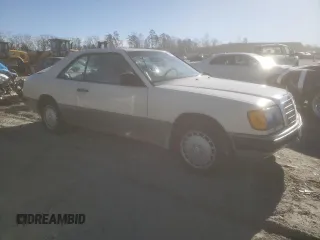 1988 Mercedes-Benz 300 with VIN WDBEA50D9JA698251, listed as a Copart auction lot 46977055 with 107,949 mi miles and Salvage Title. Bid and sale history available at DreamBid. Image 4.