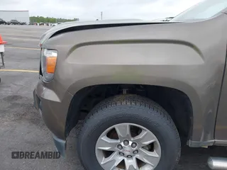 2015 GMC Canyon 2WD SLE with VIN 1GTG5BE38F1229799, listed as a IAAI auction lot 41944801 with 71,165 mi miles. Bid and sale history available at carsss.com. Image 20.