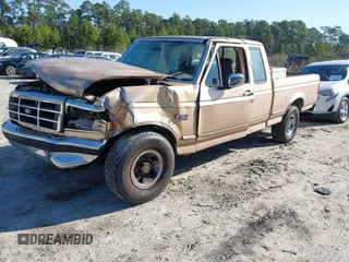 1996 Ford F-150 Special with VIN 1FTEX15N1TKA31567, listed as a IAAI auction lot 41762657 with 305,222 mi miles. Bid and sale history available at carsss.com. Image 2.