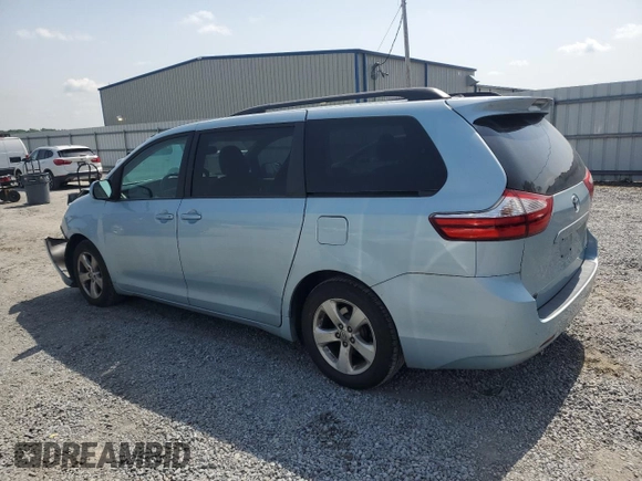 2015 Toyota Sienna LE AAS with VIN 5TDKK3DC9FS609084, listed as a Copart auction lot 57055295 with 247,531 mi miles and Salvage title. Bid and sale history available at DreamBid. Image 2.