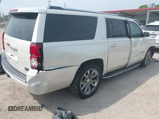 2015 Chevrolet Suburban LTZ with VIN 1GNSCKKC5FR740352, listed as a IAAI auction lot 39075234 with 112,945 mi miles and . Bid and sale history available at DreamBid. Image 4.