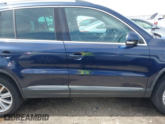 2012 Volkswagen Tiguan S with VIN WVGBV7AX3CW571039, listed as a IAAI auction lot 41928361 with 165,938 mi miles and . Bid and sale history available at DreamBid. Image 13.