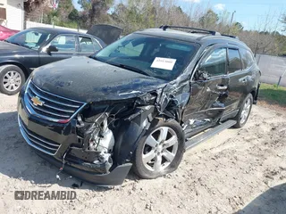 2016 Chevrolet Traverse LTZ with VIN 1GNKVJKD1GJ221893, listed as a IAAI auction lot 41913000 with 112,900 mi miles and . Bid and sale history available at DreamBid. Image 2.
