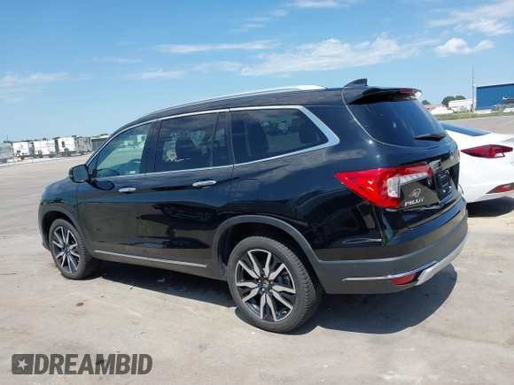 2019 Honda Pilot Touring 7-Passenger with VIN 5FNYF6H67KB031988, listed as a IAAI auction lot 42519588 with 41,368 mi miles and . Bid and sale history available at DreamBid. Image 14.