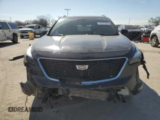 2020 Cadillac XT4 FWD Sport with VIN 1GYFZER49LF024652, listed as a Copart auction lot 46231255 with 87,567 mi miles and Salvage title. Bid and sale history available at DreamBid. Image 5.