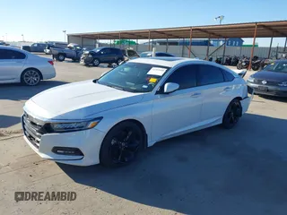 2018 Honda Accord Touring z VIN 1HGCV1F96JA144076, wystawiony jako IAAI lot #41561688 z przebiegiem 125 539 mil mil oraz . Historia ofert i sprzedaży dostępna na DreamBid. Obrazek 20.