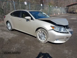 2015 Lexus ES 330 z VIN JTHBK1GG6F2180477, wystawiony jako IAAI lot #41869343 z przebiegiem 102 019 mil mil oraz . Historia ofert i sprzedaży dostępna na DreamBid. Obrazek 1.