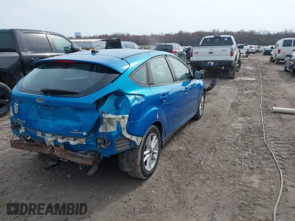 2015 Ford Focus SE with VIN 1FADP3K20FL383433, listed as a IAAI auction lot 42018563 with 101,789 mi miles. Bid and sale history available at carsss.com. Image 4.