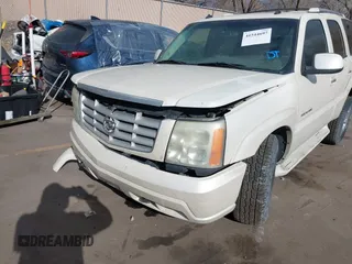 2003 Cadillac Escalade z VIN 1GYEK63N53R304400, wystawiony jako IAAI lot #41544697 z przebiegiem 207 913 mil mil oraz . Historia ofert i sprzedaży dostępna na DreamBid. Obrazek 6.