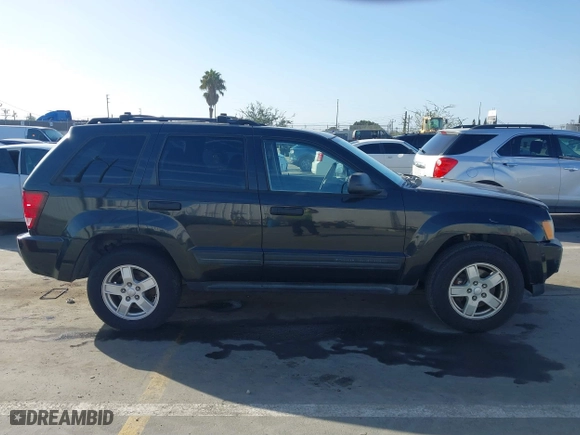 2005 Jeep Grand Cherokee Laredo with VIN 1J8GS48K95C615330, listed as a IAAI auction lot 41719101 with 152,186 mi miles. Bid and sale history available at carsss.com. Image 13.