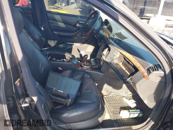 2004 Mercedes-Benz S-Class 5.0L with VIN WDBNG75J24A414813, listed as a IAAI auction lot 41911565 with 999,999 mi miles. Bid and sale history available at carsss.com. Image 5.