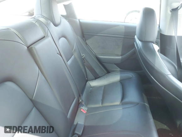 2023 Tesla Model 3 with VIN 5YJ3E1EA2PF571569, listed as a IAAI auction lot 42288715 with 30,271 mi miles and . Bid and sale history available at DreamBid. Image 8.