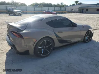 2022 Toyota GR Supra 3.0 with VIN WZ1DB0C0XNW051907, listed as a Copart auction lot 70628834 with 23,012 mi miles and Salvage Title. Bid and sale history available at carsss.com. Image 3.