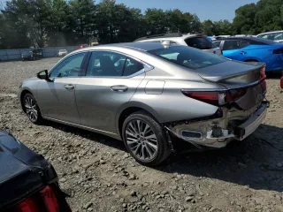 2021 Lexus ES 250 with VIN 58AD11D19MU006499, listed as a Copart auction lot 63091235 with 19,071 mi miles and Salvage title. Bid and sale history available at DreamBid. Image 2.
