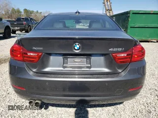 2015 BMW 4 Series 428i xDrive z VIN WBA3N9C55FK247728, wystawiony jako Copart lot #47358985 z przebiegiem 62 284 mil mil oraz Szkoda całkowita • Salvage title. Historia ofert i sprzedaży dostępna na DreamBid. Obrazek 6.