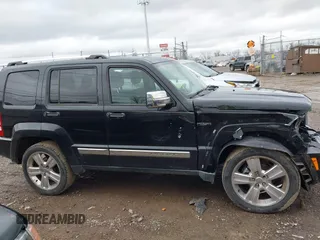 2011 Jeep Liberty Sport with VIN 1J4PN2GK2BW577724, listed as a IAAI auction lot 41032620 with 147,888 mi miles and . Bid and sale history available at carsss.com. Image 13.