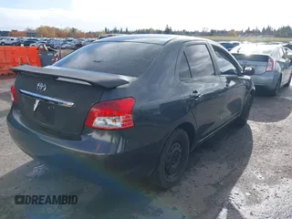 2010 Toyota Yaris with VIN JTDBT4K37A4068398, listed as a IAAI auction lot 40915313 with 123,222 mi miles. Bid and sale history available at carsss.com. Image 4.