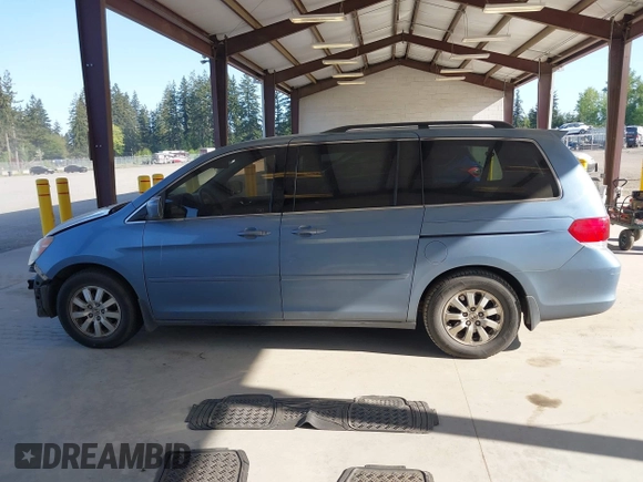 2010 Honda Odyssey EX-L with VIN 5FNRL3H61AB046416, listed as a IAAI auction lot 42157812 with 129,525 mi miles and . Bid and sale history available at DreamBid. Image 15.