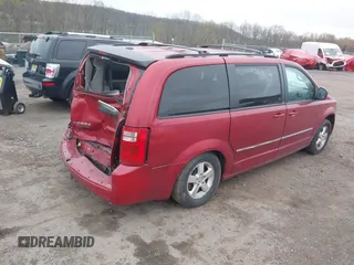 2009 Dodge Grand Caravan SXT z VIN 2D8HN54X69R593635, wystawiony jako IAAI lot #39235325 z przebiegiem 207 996 mil mil oraz . Historia ofert i sprzedaży dostępna na DreamBid. Obrazek 4.