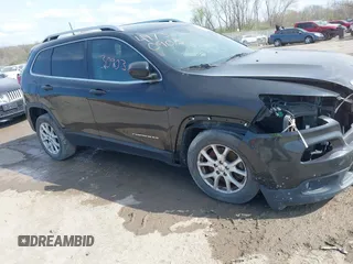 2016 Jeep Cherokee Latitude with VIN 1C4PJLCB9GW362961, listed as a IAAI auction lot 42113135 with 148,748 mi miles and . Bid and sale history available at DreamBid. Image 14.
