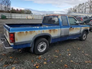 1993 Dodge Dakota z VIN 1B7GL23Y0PS104294, wystawiony jako Copart lot #76207874 z przebiegiem 142 584 mil mil oraz Czysty tytuł • Clean title. Historia ofert i sprzedaży dostępna na DreamBid. Obrazek 3.