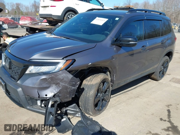 2021 Honda Passport Elite with VIN 5FNYF8H07MB018359, listed as a IAAI auction lot 41834413 with 28,278 mi miles and . Bid and sale history available at DreamBid. Image 2.