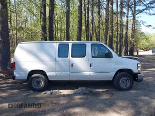 2013 Ford Econoline Cargo Commercial with VIN 1FTNE2EW7DDA15769, listed as a IAAI auction lot 41989021 with 179,557 mi miles and . Bid and sale history available at DreamBid. Image 14.