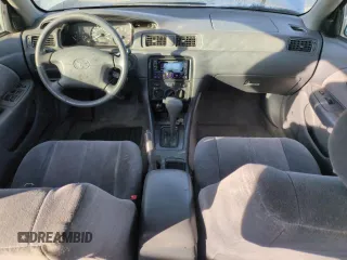 2001 Toyota Camry LE z VIN JT2BF22K810291438, wystawiony jako Copart lot #54261565 z przebiegiem 174 101 mil mil oraz Szkoda całkowita • Salvage title. Historia ofert i sprzedaży dostępna na DreamBid. Obrazek 8.