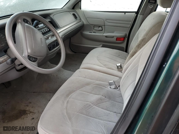 2000 Ford Crown Victoria with VIN 2FAFP73WXYX157746, listed as a Copart auction lot 82748804 with 56,820 mi miles and Salvage Title. Bid and sale history available at carsss.com. Image 7.