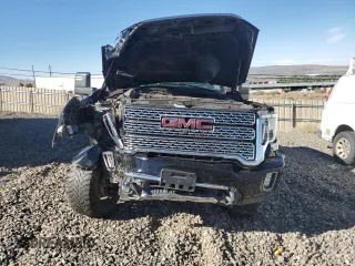 2021 GMC Sierra 3500HD Denali z VIN 1GT49WEY3MF296109, wystawiony jako Copart lot #67886764 z przebiegiem Nie podano mil oraz Szkody całkowita. Historia ofert i sprzedaży dostępna na DreamBid. Obrazek 5.