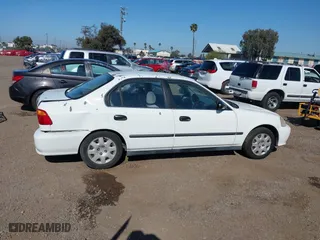 2000 Honda Civic LX with VIN 2HGEJ6673YH502410, listed as a IAAI auction lot 41992745 with 173,958 mi miles. Bid and sale history available at carsss.com. Image 13.